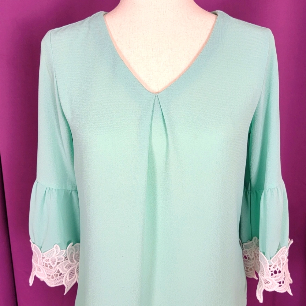 Sea green top with lace sleeves